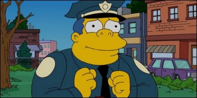 Dans "Les Simpson", quel est le rôle de Clancy Wiggum dans la police ?