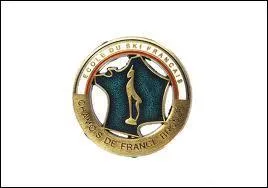 Quelle est cette médaille attribuée par l'E.S.F, récompensant une épreuve chronométrée de slalom spécial aux skieurs ne dépassant pas 17 % du temps de l'ouvreur ?