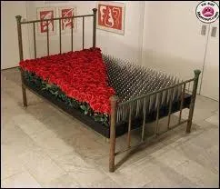 Par quel signe représente-t-on le lit de pose ?