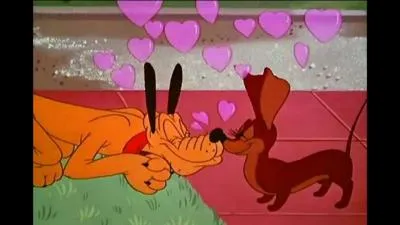 Quant à Pluto, il rêve à ce 14 février 1942 où il flirtait avec Dinah. De quelle race est-elle ?