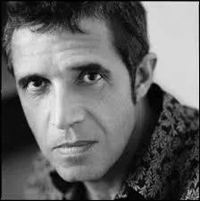 En quelle année sort-il son douzième album qui inclut "Femmes, je vous aime" ?