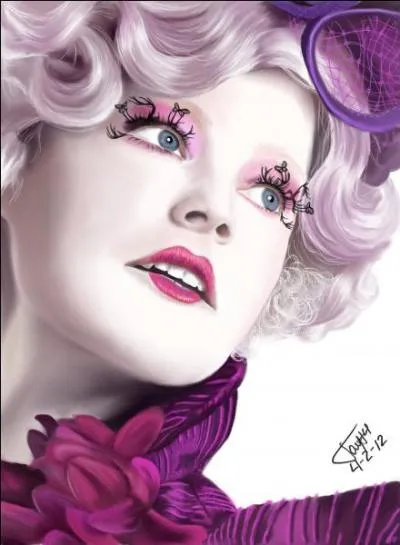 Quelle est la grande particularité d'Effie Trinket au niveau vestimentaire ?
