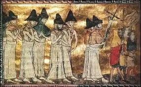 L'église est discréditée à cause de son impuissance. Des cultes violents et macabres font leur apparition. Quel groupe dissident catholique fait des processions de ville en ville, implorant Dieu à expier les péchés des humains ?