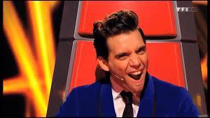 Début 2014, dans quelle émission devient-il coach ?