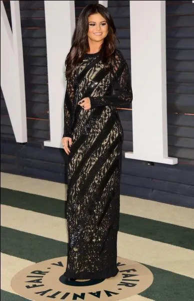 Avec quelle star a-t-elle collabor&eacute; pour la chanson " I Want You To Know" ?