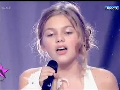 À l'âge de 12 ans, pour quelle émission s'inscrit-elle ?