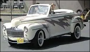 Comment Danny baptise-t-il la nouvelle voiture de Kenickie ?
(en français)