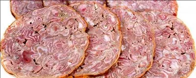 Dans quelle ville du Calvados fait-on l'andouille ?