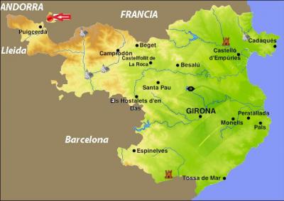 Quel est le nom de la ville, enclave espagnole en territoire français, entre Pyrénées espagnoles et françaises ?