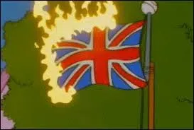 Un drapeau est en train de brûler. De quel pays s'agit-il ?