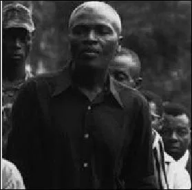 Né en 1914 à Ndumla, arrondissement de Bana, région occidentale du Cameroun. Il est mort fusillé le 15 janvier 1971, à Bafoussam. Il succède à Félix-Roland Moumié, à la mort de ce dernier, en tant que président de l'UPC.