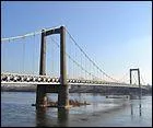 Ce pont suspendu de 309 m de long, sur la Loire, dans le d&eacute;partement de Loire-Atlantique, a &eacute;t&eacute; construit en 1954 &agrave; :