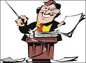 Le « speaker » est entouré de « posters » vantant son action politique.