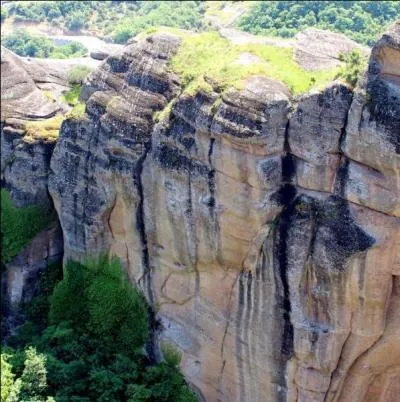 De quelle cité grecque son père était-il le roi ?