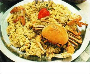 Mon premier m'appartient.
Mon second et mon troisième, réunis, deviennent canins.
Avec des crabes de terre, mon tout est un plat traditionnel de Pâques en Guadeloupe.