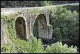 Ce pont de 3 arches, long de 78 mètres sur le río Bibei, date du 2e siècle. il est situé en Galice à :
