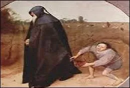 C'est une partie de l'anatomie du personnage de droite qui nous indique ce qu'il traîne.