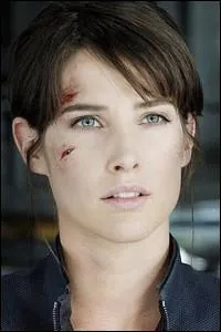 Dans ce film, elle interprète Maria Hill. À la télévision, elle est à l'affiche de la série "How I met your mother". Qui est-ce ?