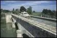 Les travaux de ce pont-canal ont débuté en 1939 et ont duré 10 ans. En pierre de taille du Quercy, il mesure 539m de long et possède 23 arches et 22 piliers. Où est-il et quel cours d'eau enjambe-t-il ?