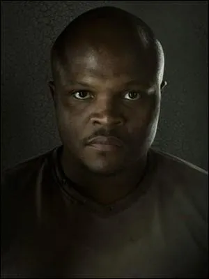 T-Dog meurt de façon héroïque. De quel personnage sauve-t-il la vie en se sacrifiant  ?