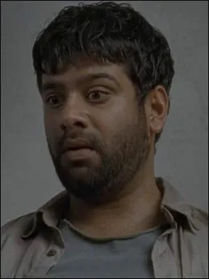 Ce personnage soigne les infectés de la prison en compagnie d'Hershel. Il mourra lui-même des suites de la maladie. Comment le nomme-t-on  ?