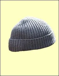 Notre personnage est toujours coiffé de ce bonnet. Qui est-il ?