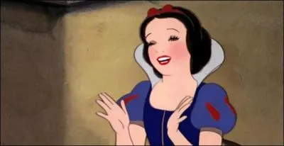 Quelles sont les couleurs des habits de Simplet, dans "Blanche Neige et les Sept Nains" ?