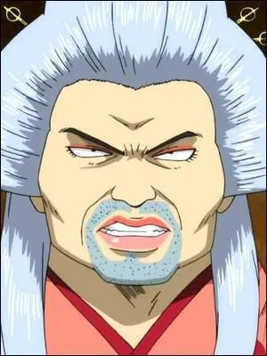 Ce grand baraqué, autrefois champion de lutte, est désormais le propriétaire du club de travestis de la ville (dans lequel il n'est pas le seul à avoir une apparence assez flippante, d'ailleurs). Il s'agit de :