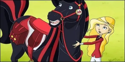 Dans "Horseland", à qui appartient Scarlet ?