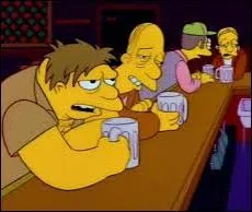 Comment s'appelle le pilier de comptoir à l'avant plan une chope à la main, le meilleur client de Moe ?