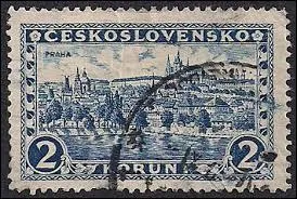 Regardez attentivement le nom du pays marqué sur ce timbre. Pourriez-vous me citer la date à laquelle ce pays fut "dissout", donnant lieu à la création de deux nations distinctes et indépendantes ?