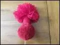 Généralement, en quoi fait-on un pompon ?