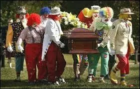 Laquelle de ces expressions traduit l'action de mettre le corps d'un mort dans un cercueil ?