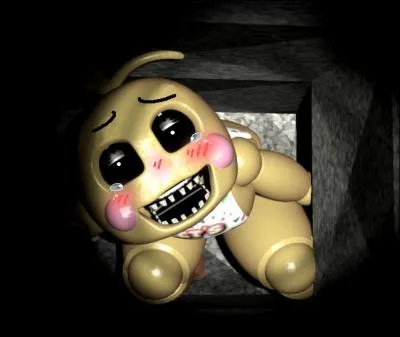 Qu'est-il écrit sur la bavette de Toy Chica ?