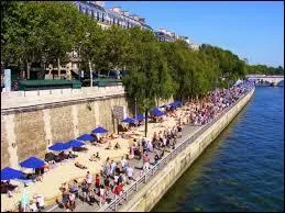 Chaque année entre mi-juillet et mi-août se tient "Paris Plages" ou une portion de route est recouverte de sable. Quand cette opération estivale a-t-elle été créée ?