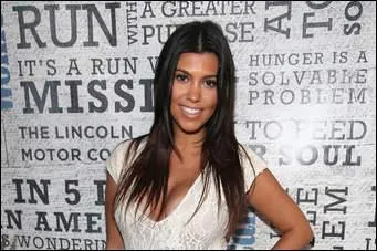 Quelle couleur ont les yeux de leur grande sur Kourtney ?