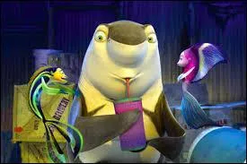 Comment s'appelle le gentil requin végétarien qui aime se déguiser en dauphin dans le film d'animation "Gang de requins" ?