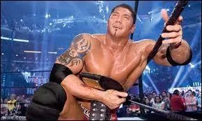 Contre quel catcheur a-t-il remporté son premier World Heavyweight Championship, lors de WrestleMania 21 ?