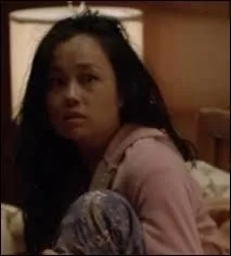 Comment s'appelle la jeune femme chinoise séquestrée par Shelby et libérée par Norman et Emma, puis tuée par le shérif adjoint ?