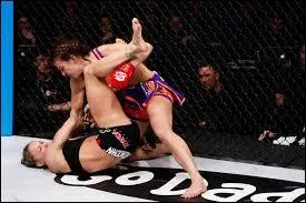 Qui remporta la première rencontre opposant Miesha Tate à Ronda Rousey ?