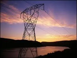 Quel est le symbole de la tension électrique ?