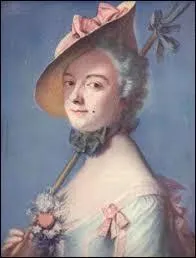 Petit rond de taffetas ou de velours noir, ou d'un point de crayon spécial, imitant le grain de beauté, que les femmes se mettaient parfois sur le visage ou sur le décolleté :