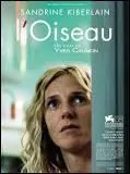 Comment le personnage principal du film "L'Oiseau" se nomme-t-il ?