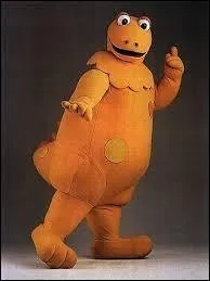 Comment s'appelle ce dinosaure orange devenu la mascotte de l'émission "L'Île aux enfants" ?