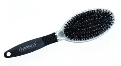 En compétition, quelle est la coiffure obligatoire pour les gymnastes ?