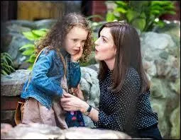 Quelques jours plus tard, Ben emmène Paige à la fête de Maddie. Que dit Paige concernant cette rouquine ?