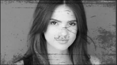 Elle joue le rôle de Malia Hale (Tate), une coyote-garou qui a perdu sa sur et sa mère dans un accident de voiture.