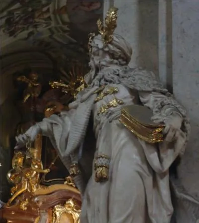 Ce personnage se trouve dans un édifice caractéristique de l'architecture baroque, lequel ?