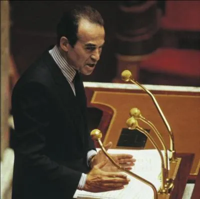 Comment s'appelait la thèse écrite par Robert Badinter en 1952 ?