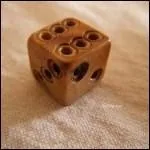 L'invention du dé (pour jouer) vient avant ou après l'invention de la flûte ?